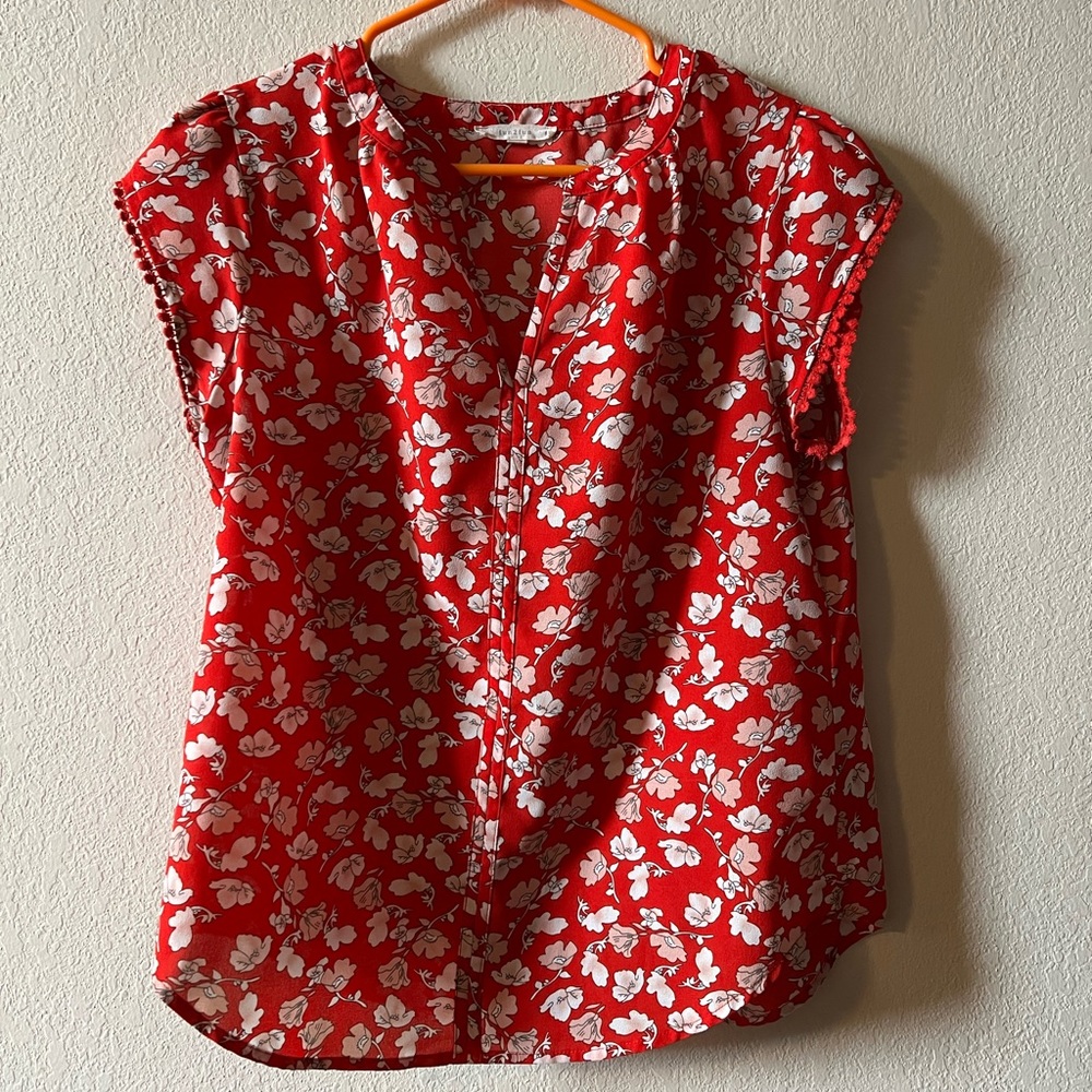 Red, white, and light pink floral print scalloped sleeve top